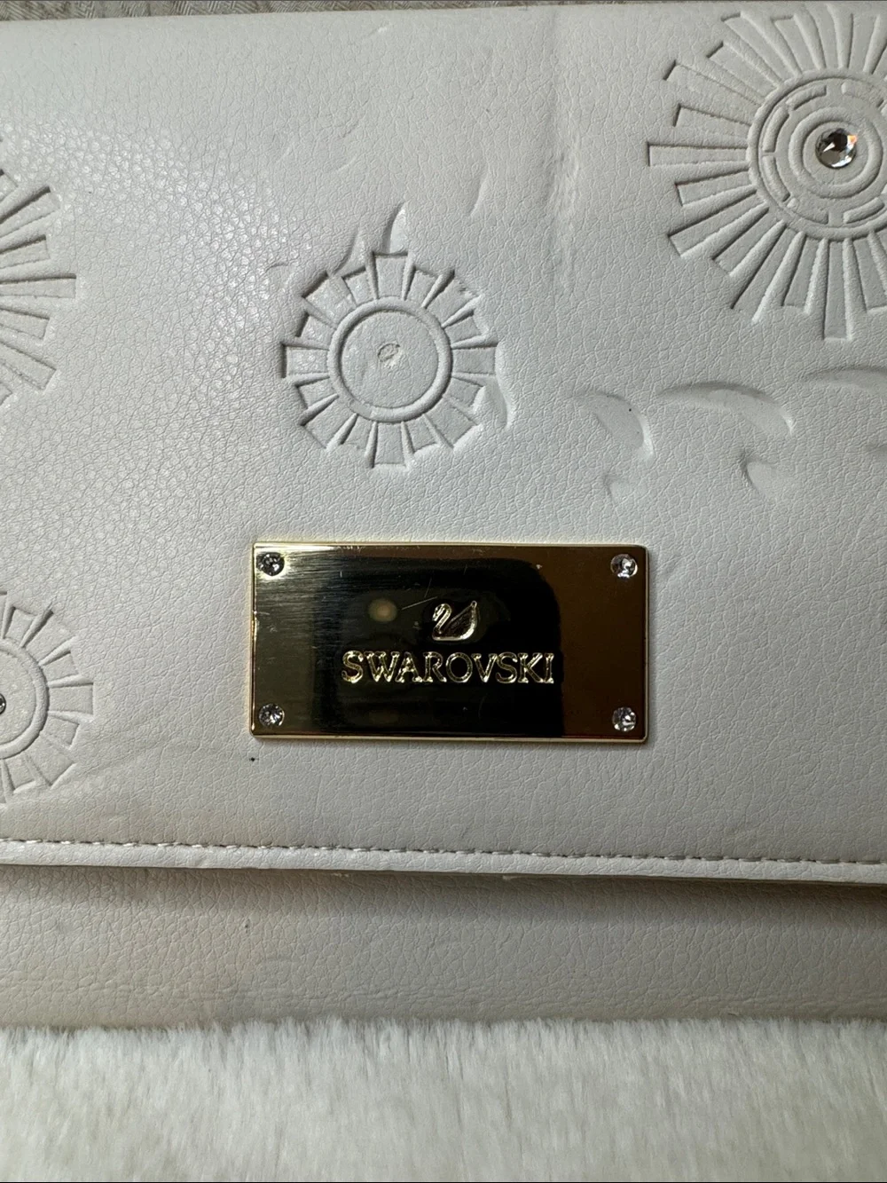 Swarovski Ivory Embossed Floral Wristlet Clutch